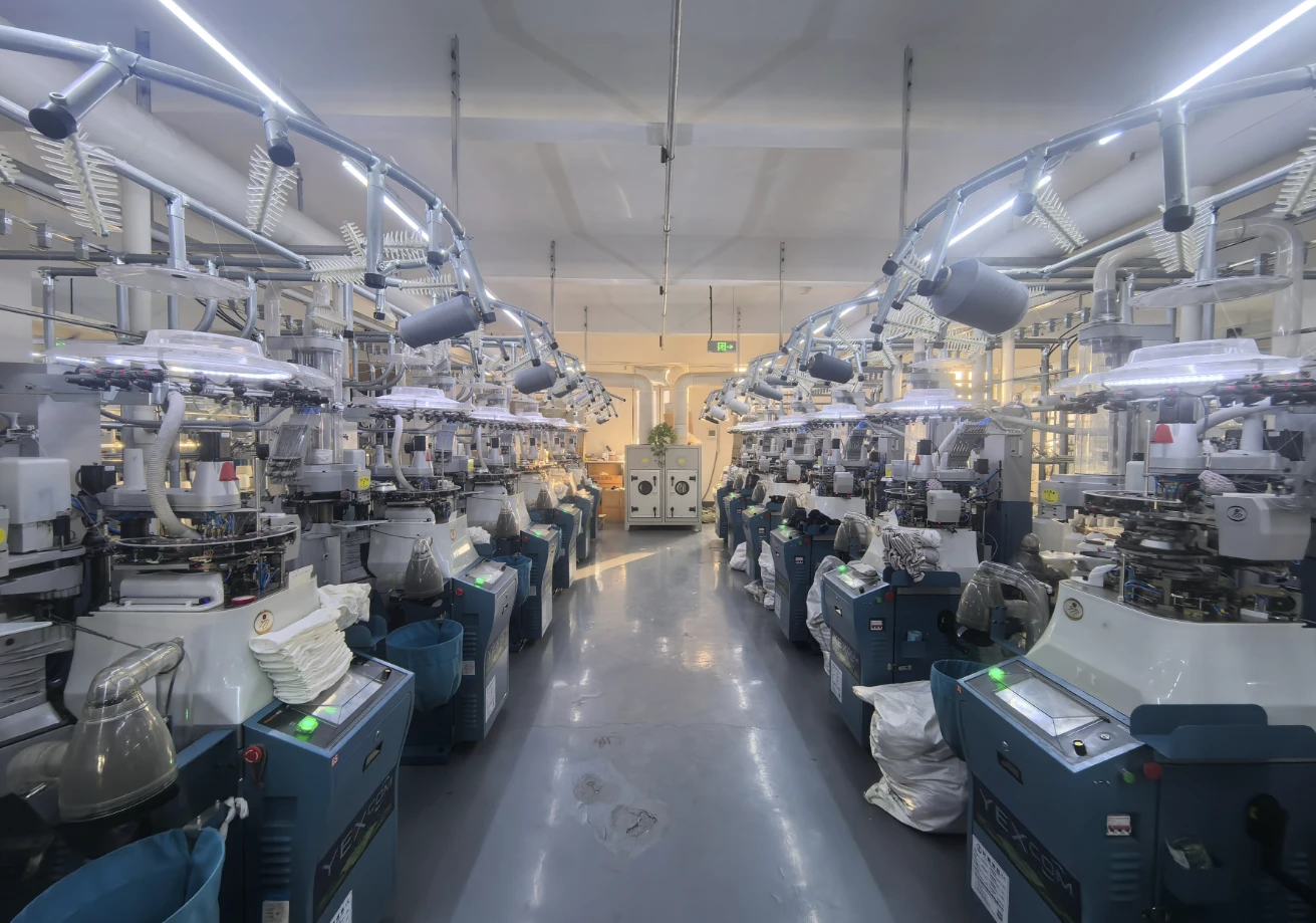 Sock-knitting machines in the Yiwu factory workshop